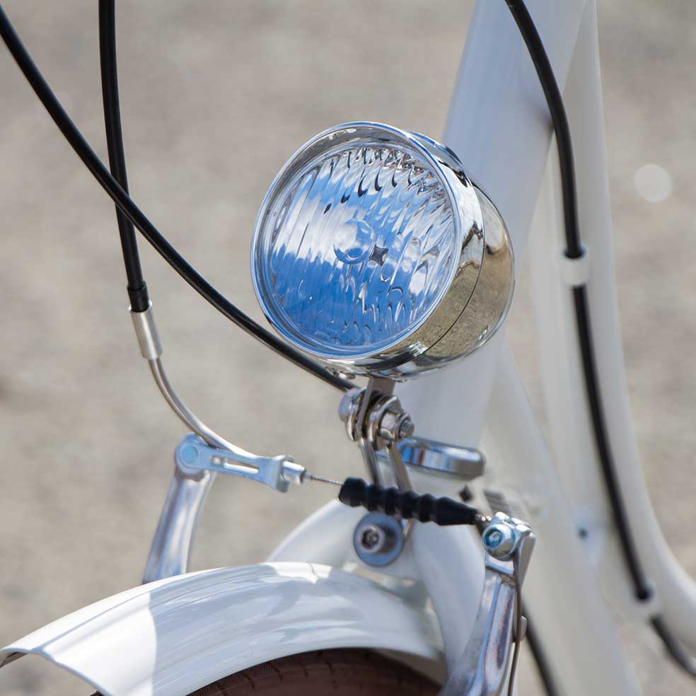Vélo de ville Coffee mixte. Lumière de ce vélo pour voir et être vu pour vos trajets en ville. Vélotaf, vélo publicitaire et vélo de fonction